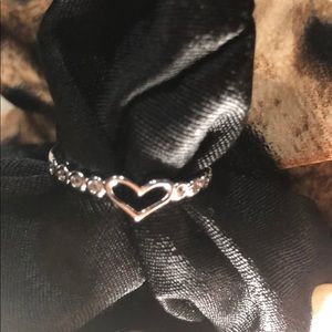 Silver heart ring with rhinestones in side